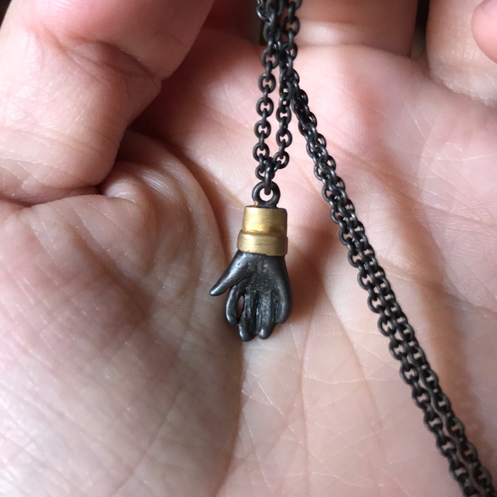 Open palm necklace